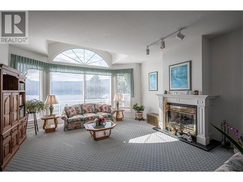 16850 Commonage Road, Lake Country, BC - Indoor Photo Showing Living Room With Fireplace