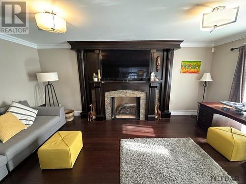 1212 Lavigne Blvd, Timmins, ON - Indoor Photo Showing Living Room With Fireplace