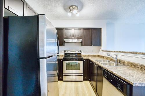 1340 Main Street E|Unit #303, Milton, ON - Indoor Photo Showing Kitchen With Stainless Steel Kitchen With Double Sink