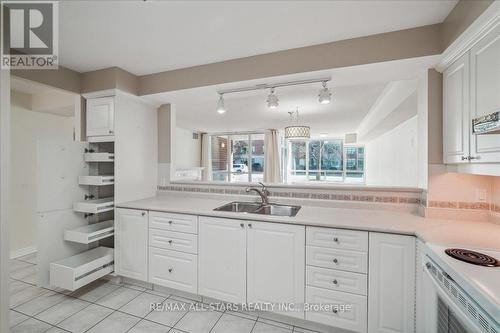 #110 -50 The Boardwalk Way, Markham, ON - Indoor Photo Showing Kitchen With Double Sink