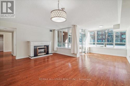 #110 -50 The Boardwalk Way, Markham, ON - Indoor Photo Showing Living Room With Fireplace