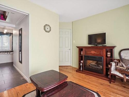 Office - 78 Rue Du Commandant, Blainville, QC - Indoor Photo Showing Living Room With Fireplace