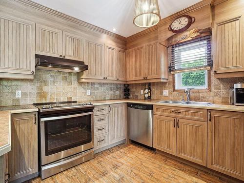 Kitchen - 78 Rue Du Commandant, Blainville, QC - Indoor Photo Showing Kitchen With Double Sink