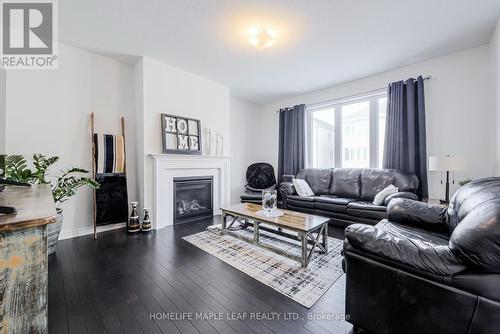 647 Anishinaabe Drive, Shelburne, ON - Indoor Photo Showing Living Room With Fireplace