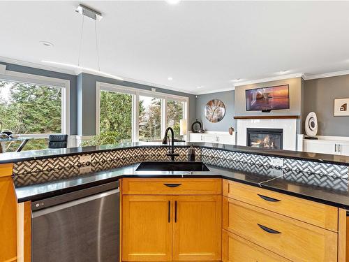 3605 Collingwood Dr, Nanoose Bay, BC - Indoor Photo Showing Kitchen With Fireplace