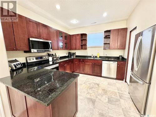 7 211 20Th Street W, Prince Albert, SK - Indoor Photo Showing Kitchen With Stainless Steel Kitchen