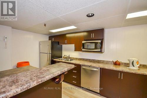 #606 -1964 Main St W, Hamilton, ON - Indoor Photo Showing Kitchen With Double Sink