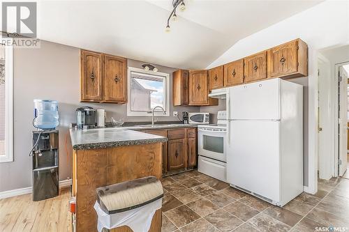 111 Green Avenue, Regina Beach, SK - Indoor Photo Showing Kitchen With Double Sink