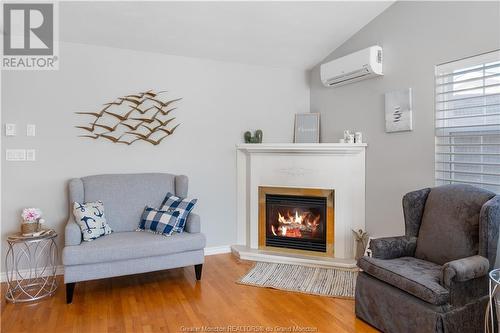 9 Elm Lane, Pointe Du Chene, NB - Indoor Photo Showing Living Room With Fireplace