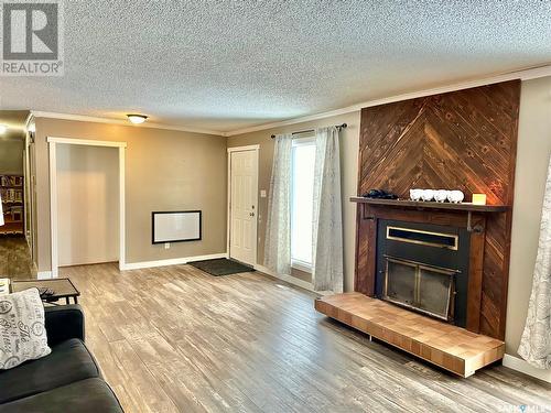 513 2Nd Street E, Spiritwood, SK - Indoor Photo Showing Living Room With Fireplace