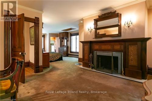 9255 Old Street Line, Chatham-Kent, ON - Indoor With Fireplace