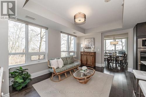 #203 -3500 Lakeshore Rd W, Oakville, ON - Indoor Photo Showing Living Room With Fireplace