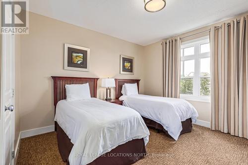 206 - 115 Fairway Court, Blue Mountains, ON - Indoor Photo Showing Bedroom