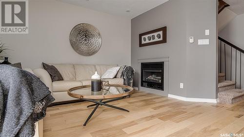 D4 33 Wood Lily Drive, Moose Jaw, SK - Indoor Photo Showing Living Room With Fireplace