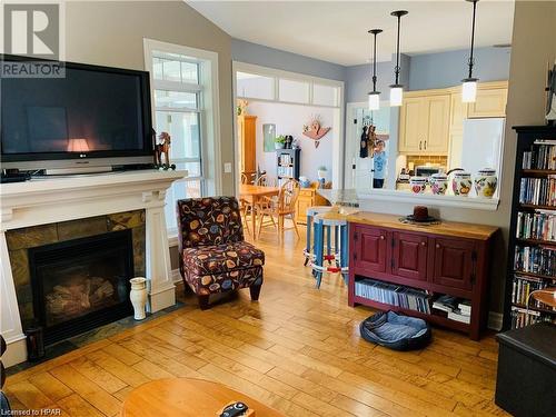22 Thimbleweed Drive, Bayfield, ON - Indoor Photo Showing Living Room With Fireplace