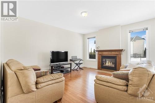 718 Beaudelaire Street, Ottawa, ON - Indoor Photo Showing Living Room With Fireplace