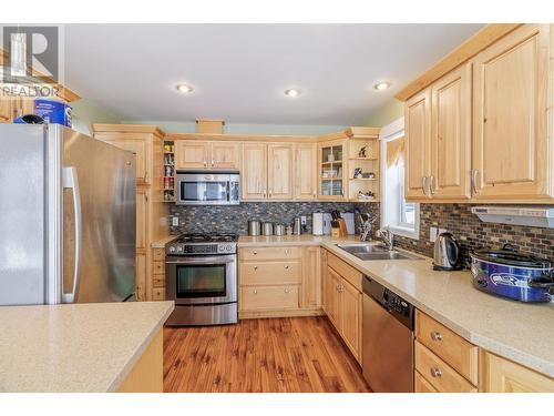 4595 Caverly Road, Lac La Hache, BC - Indoor Photo Showing Kitchen With Double Sink