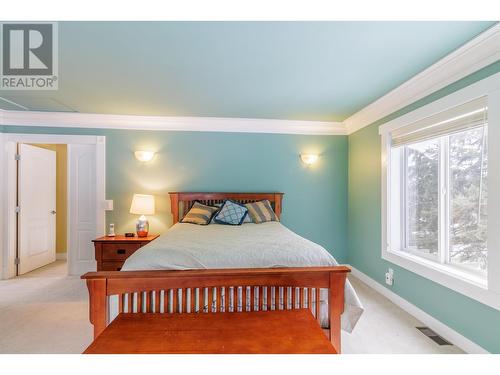 4595 Caverly Road, Lac La Hache, BC - Indoor Photo Showing Bedroom