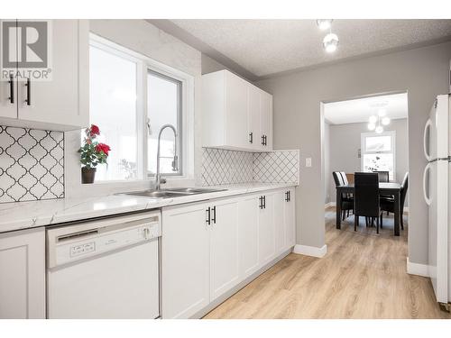 7880 Pleasant Valley Road, Vernon, BC - Indoor Photo Showing Kitchen With Double Sink