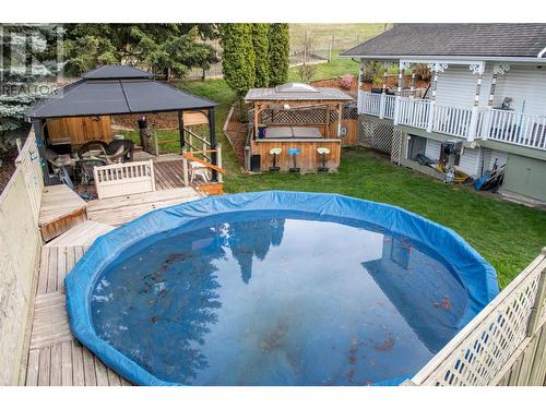 6655 Cosens Bay Road, Coldstream, BC - Outdoor With Above Ground Pool With Deck Patio Veranda With Backyard