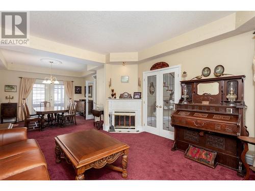 6655 Cosens Bay Road, Coldstream, BC - Indoor Photo Showing Living Room With Fireplace