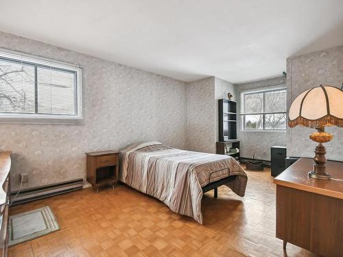 Master bedroom - 43 Rue Jean-Yves, Montréal (L'Île-Bizard/Sainte-Geneviève), QC - Indoor Photo Showing Bedroom