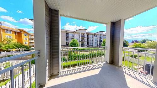 203-563 Yates Road, Kelowna, BC - Outdoor With In Ground Pool