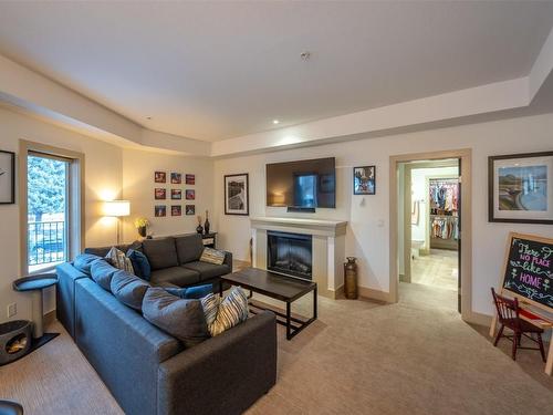 102-250 Waterford Street, Penticton, BC - Indoor Photo Showing Living Room With Fireplace
