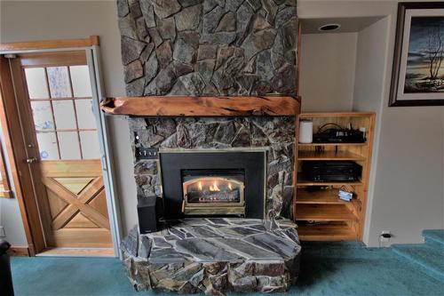 1070 Hayes Creek Place, Princeton, BC - Indoor Photo Showing Living Room With Fireplace