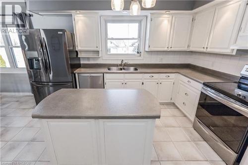 150 Mcfarlin Drive, Mount Forest, ON - Indoor Photo Showing Kitchen With Double Sink