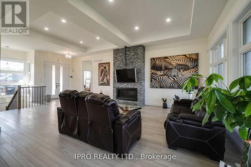 12 Hudson Drive, Brant, ON - Indoor Photo Showing Living Room With Fireplace