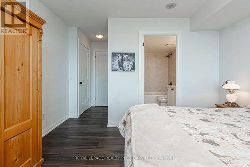 #911 -2365 Central Park Dr, Oakville, ON - Indoor Photo Showing Bedroom