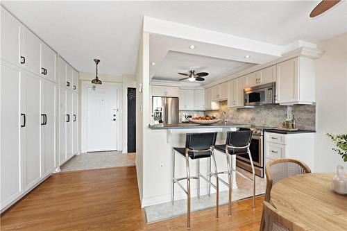 *VIRTUALLY STAGED - 28 Robinson Street N|Unit #403, Grimsby, ON - Indoor Photo Showing Other Room