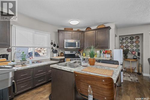 575 20Th Street E, Prince Albert, SK - Indoor Photo Showing Kitchen With Double Sink