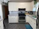 104 1St Street E, Weirdale, SK  - Indoor Photo Showing Kitchen With Double Sink 
