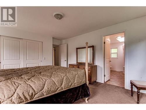 31 Violet Road, Grindrod, BC - Indoor Photo Showing Bedroom