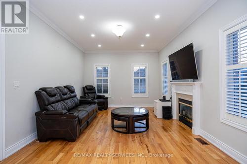 23 Brentcliff Drive, Brampton, ON - Indoor Photo Showing Living Room With Fireplace