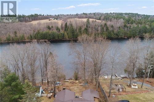 Perfected situated to enjoy your majestic setting - 72 Stringers Lane, Burnstown, ON - Outdoor With Body Of Water With View
