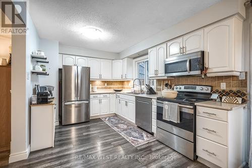 #10 -2185 Fairchild Blvd, Burlington, ON - Indoor Photo Showing Kitchen With Stainless Steel Kitchen