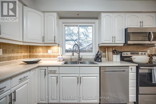 #10 -2185 Fairchild Blvd, Burlington, ON - Indoor Photo Showing Kitchen With Double Sink