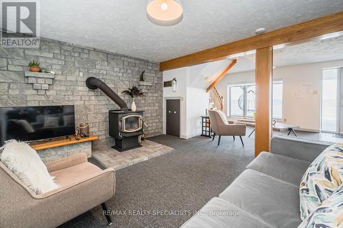 101 North Shore Road, Northern Bruce Peninsula, ON - Indoor Photo Showing Living Room With Fireplace