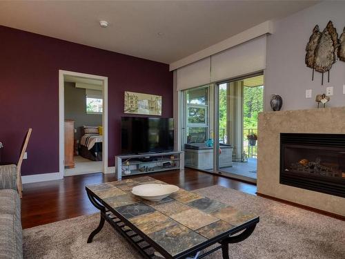 306-3223 Selleck Way, Colwood, BC - Indoor Photo Showing Living Room With Fireplace
