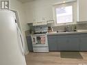 13 Logan Crescent E, Yorkton, SK  - Indoor Photo Showing Kitchen With Double Sink 