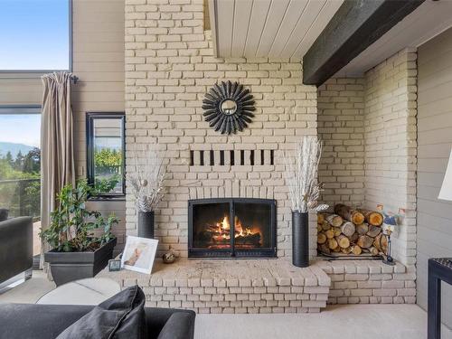 2221 Sunset Point, Blind Bay, BC - Indoor Photo Showing Living Room With Fireplace