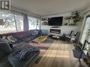 4709 44 Street Ne, Chetwynd, BC  - Indoor Photo Showing Living Room With Fireplace 