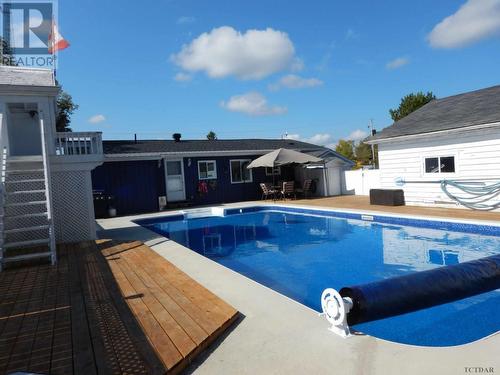 74 Empire St, Latchford, ON - Outdoor With In Ground Pool