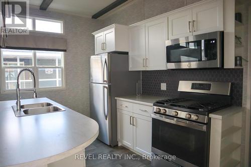 #Qmd182 -490 Empire Rd, Port Colborne, ON - Indoor Photo Showing Kitchen With Double Sink With Upgraded Kitchen
