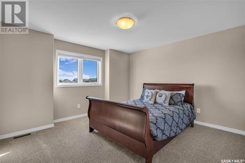 424 Snead Crescent, Warman, SK - Indoor Photo Showing Bedroom