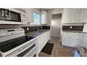 128 Red Willow Avenue, Tumbler Ridge, BC  - Indoor Photo Showing Kitchen With Double Sink 