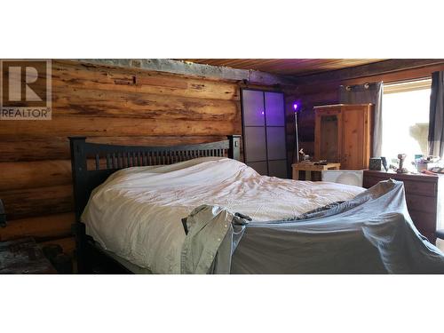 6694 Fawn Creek Road, 100 Mile House, BC - Indoor Photo Showing Bedroom
